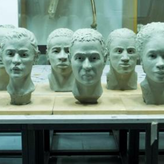 New York art students mold clay into faces of city's nameless