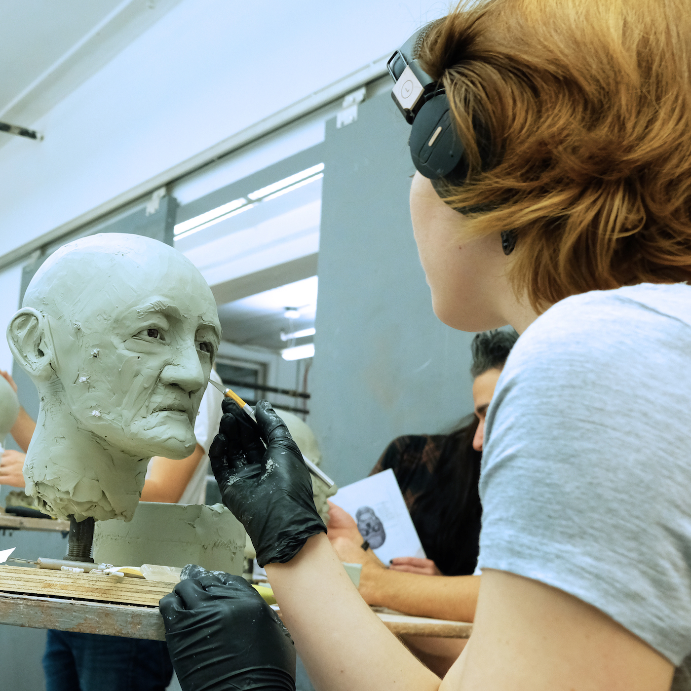 NYC art students mold clay into faces of dead, nameless migrants