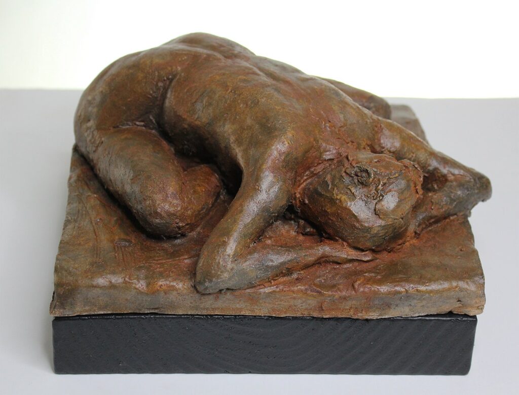 Forward Bend, by Regiane Donadio, 2019, graphite with wooden base
