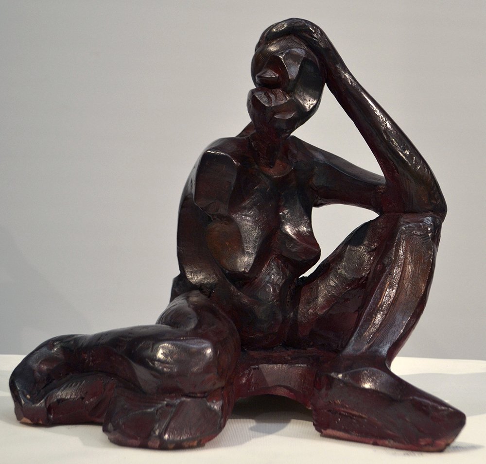 Desolation, by Precious Eboigbodin, 2024, graphite powder, spray paint, and wax on terracotta
