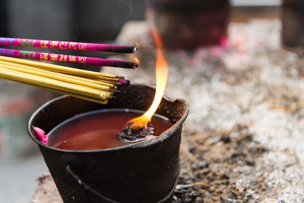 Burning Incense Sticks Near A-Ma Temple, by Ken Carl, 2013, photograph