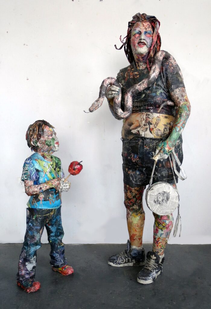 Adam and Eve at Coney Island, by Will Kurtz, 2017, wood, wire, newspaper, tape, glue, and varnish