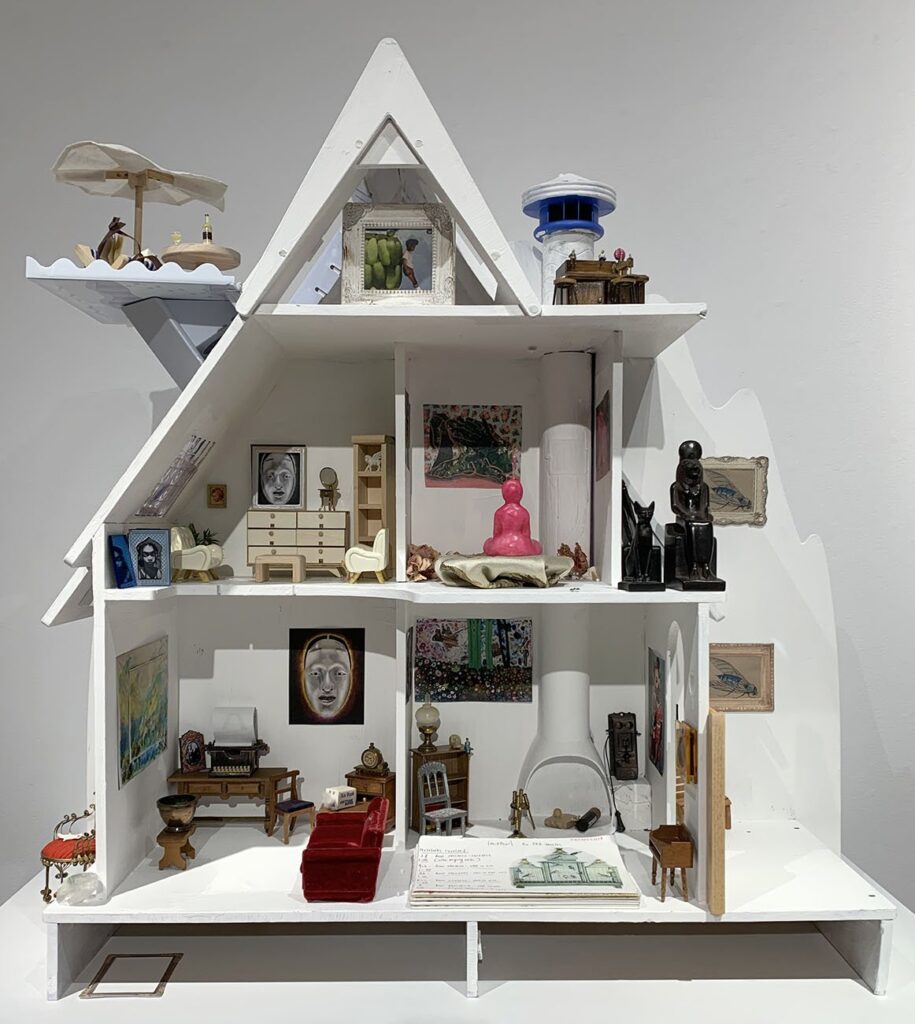 by Paola Yamel Lima, 2023, wood, acrylic, inkjet prints on paper, painters tape, glue, miniature furniture