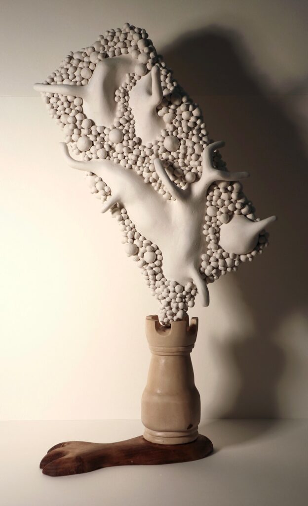 Rook, by Raena Park, 2022, wood and paper clay