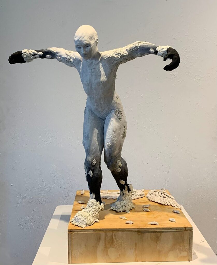 Seraphim to Human, by Devora Shoshana, 2022, clay, Sodalite pigment, and Magnetite pigment