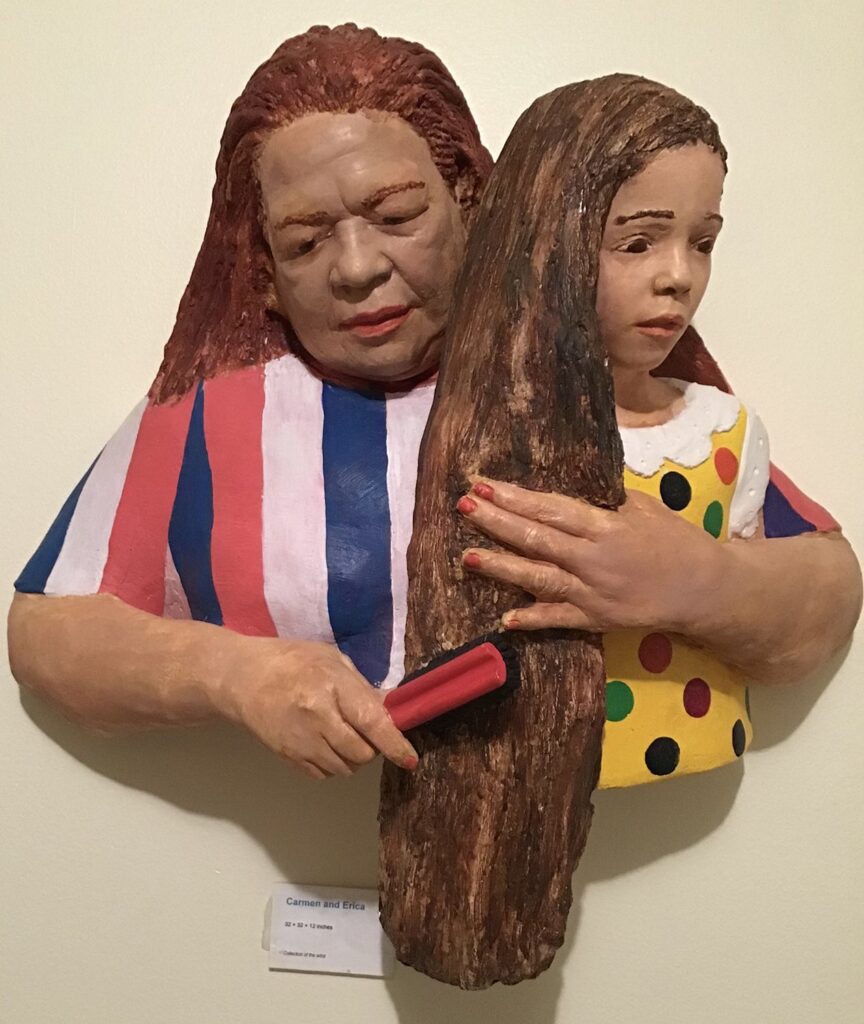 Erica and Her Grandmother, by Rigoberto Torres, 1995, acrylic painting over reinforced hydrocal