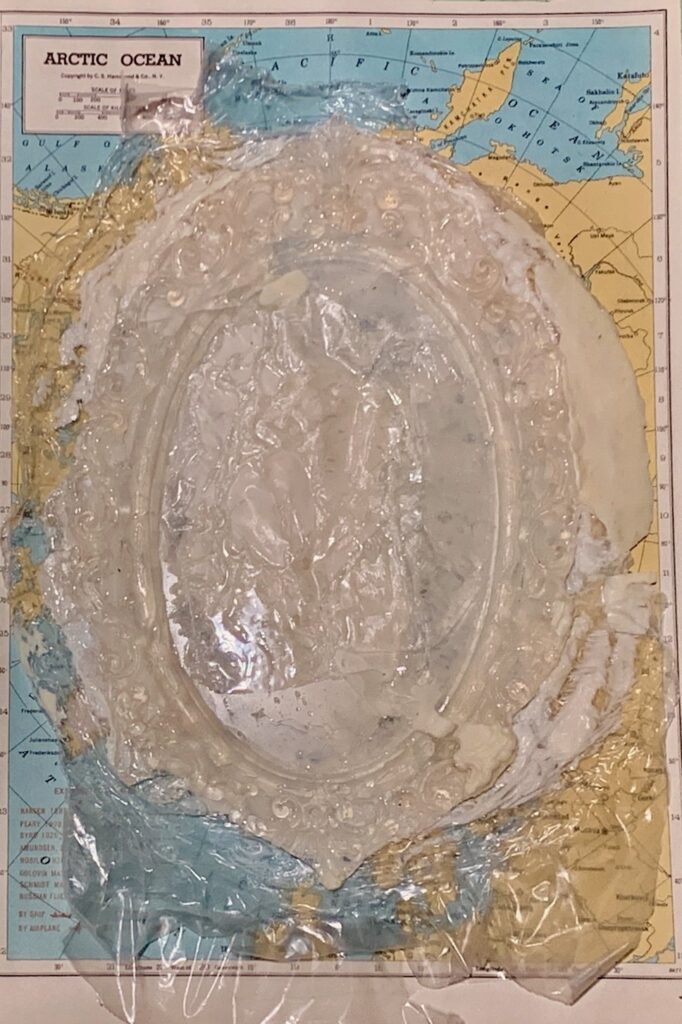 Mend the World 3, by Jennifer Delilah Trammell, 2020, resin, map, and beeswax