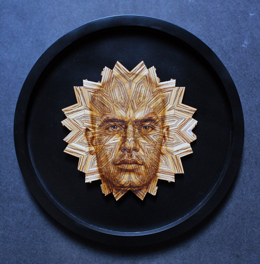Jago, by Jorge Vasquez, 2023, wood and oil, 10 x 10 x .25 inches, 16 inches diameter framed
