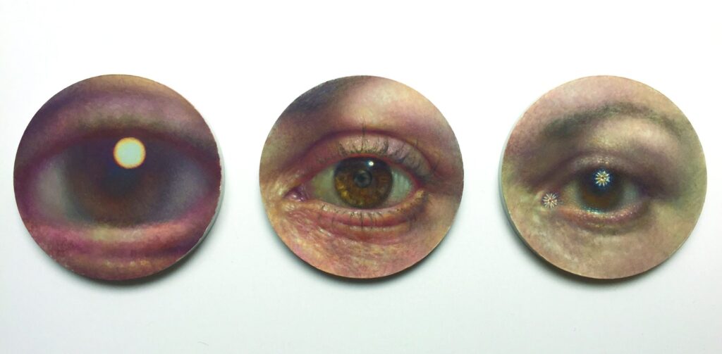 Phoropter Triptych, by Anna Wakitsch, 2017, Oil on paper mounted on lucite, 3.5 inches diameter each
