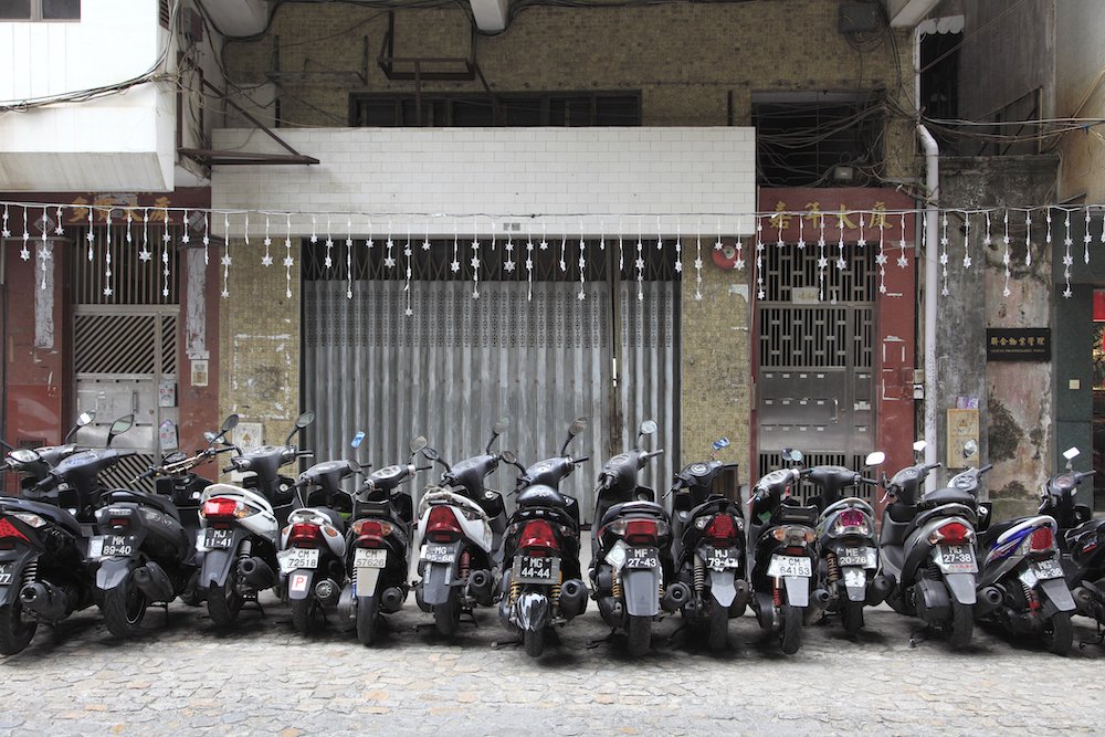 Motorcycles Parked Outside a Residential Neighborhood, by Wendy Connett, 2013, photograph