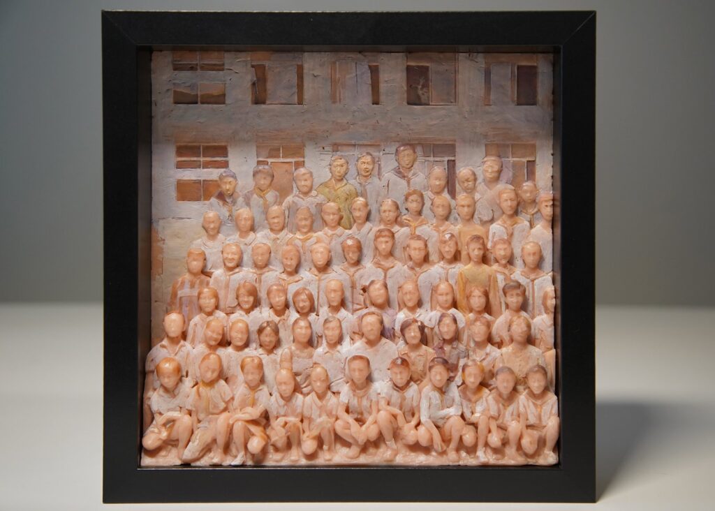 Graduation, by Jiannan Wu, 2019, acrylic on plastic and wood